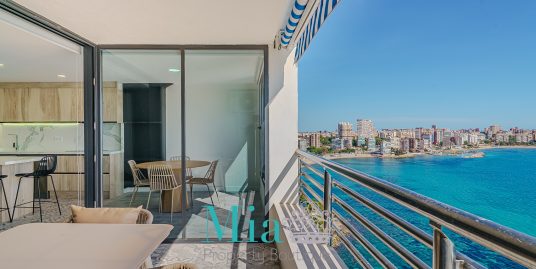 Exclusive Beachfront Apartment in Alicante: Panoramic Views & Iconic Design